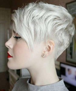 Pixie cut with long bangs and gray hair color